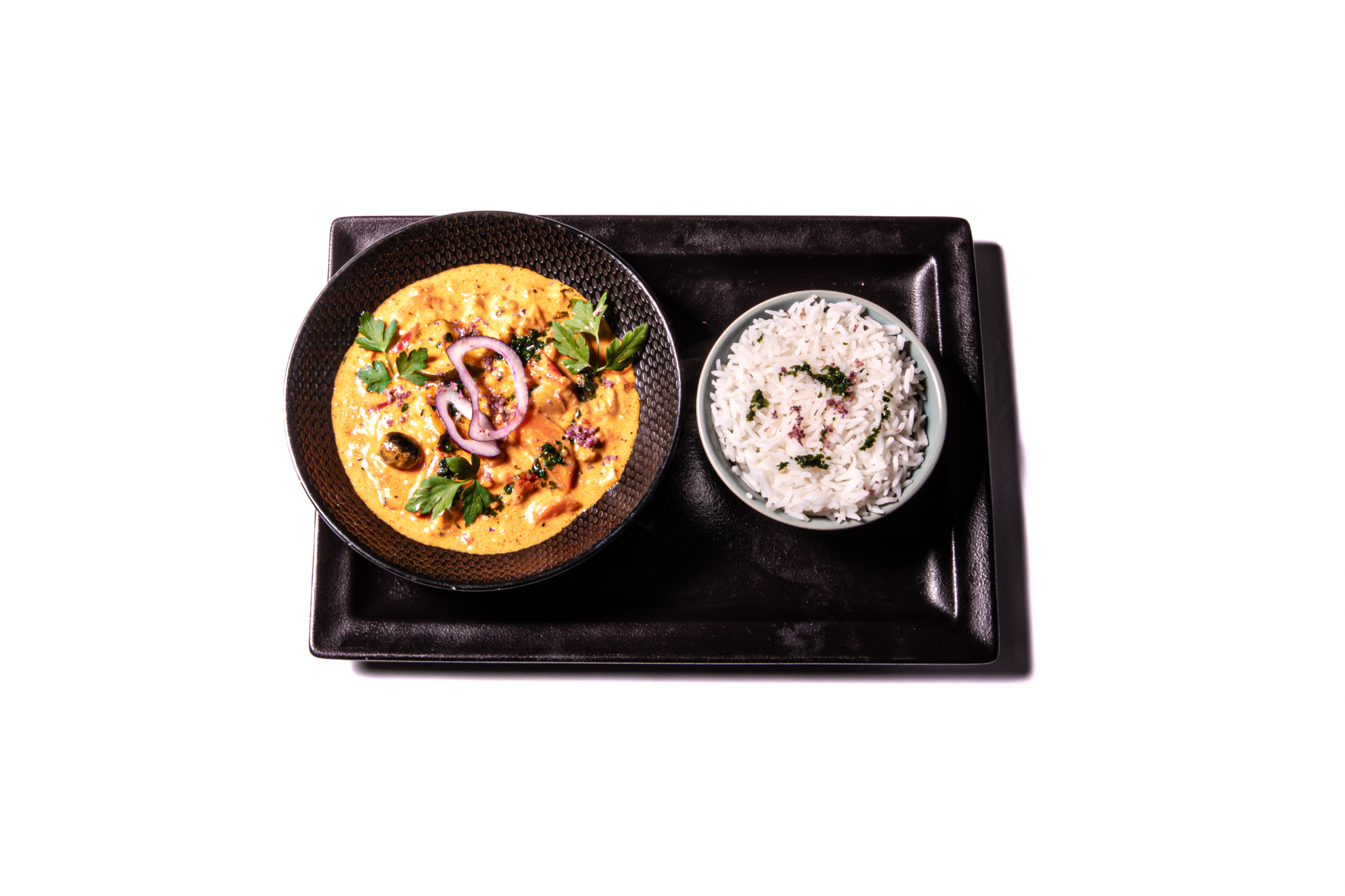 Calamar façon Styvel aux épices créoles - Vue de face- Restaurant Le Styvel Assiette de Calamar façon Styvel aux épices créoles - vue de face